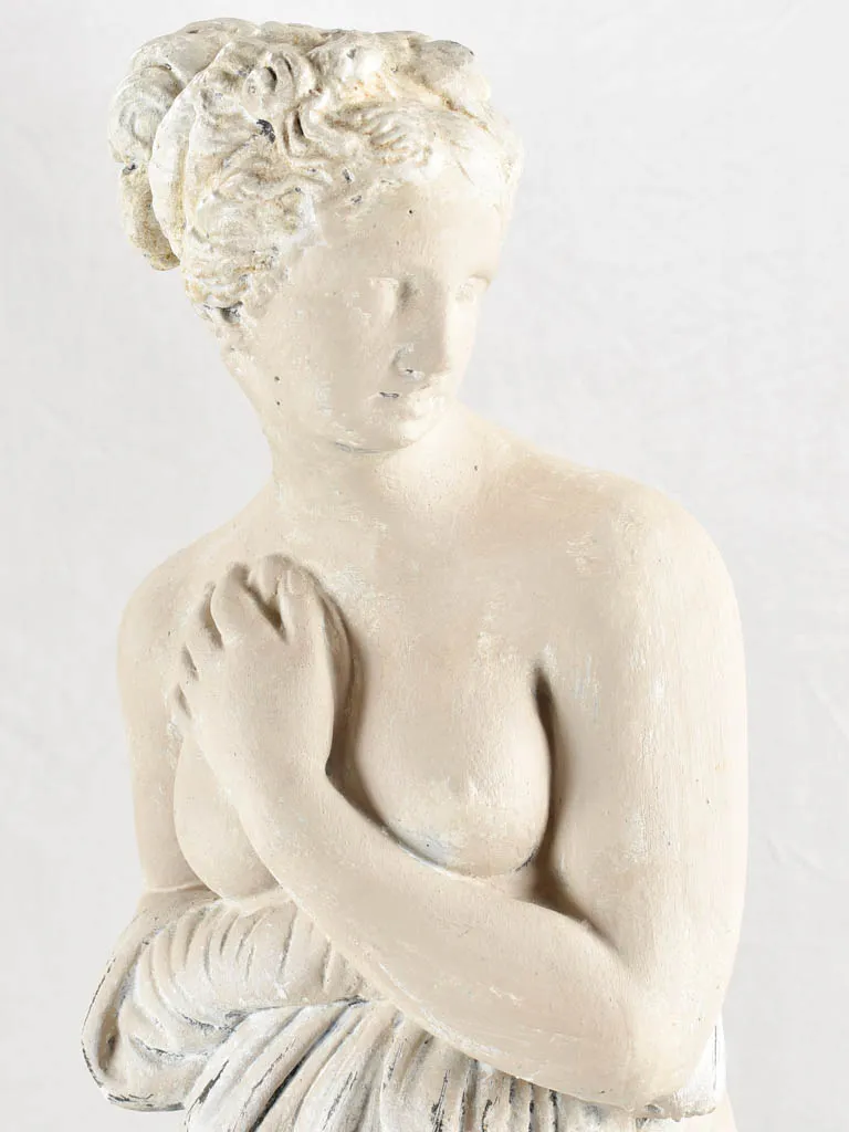 Art Deco style figurative statue on pedestal