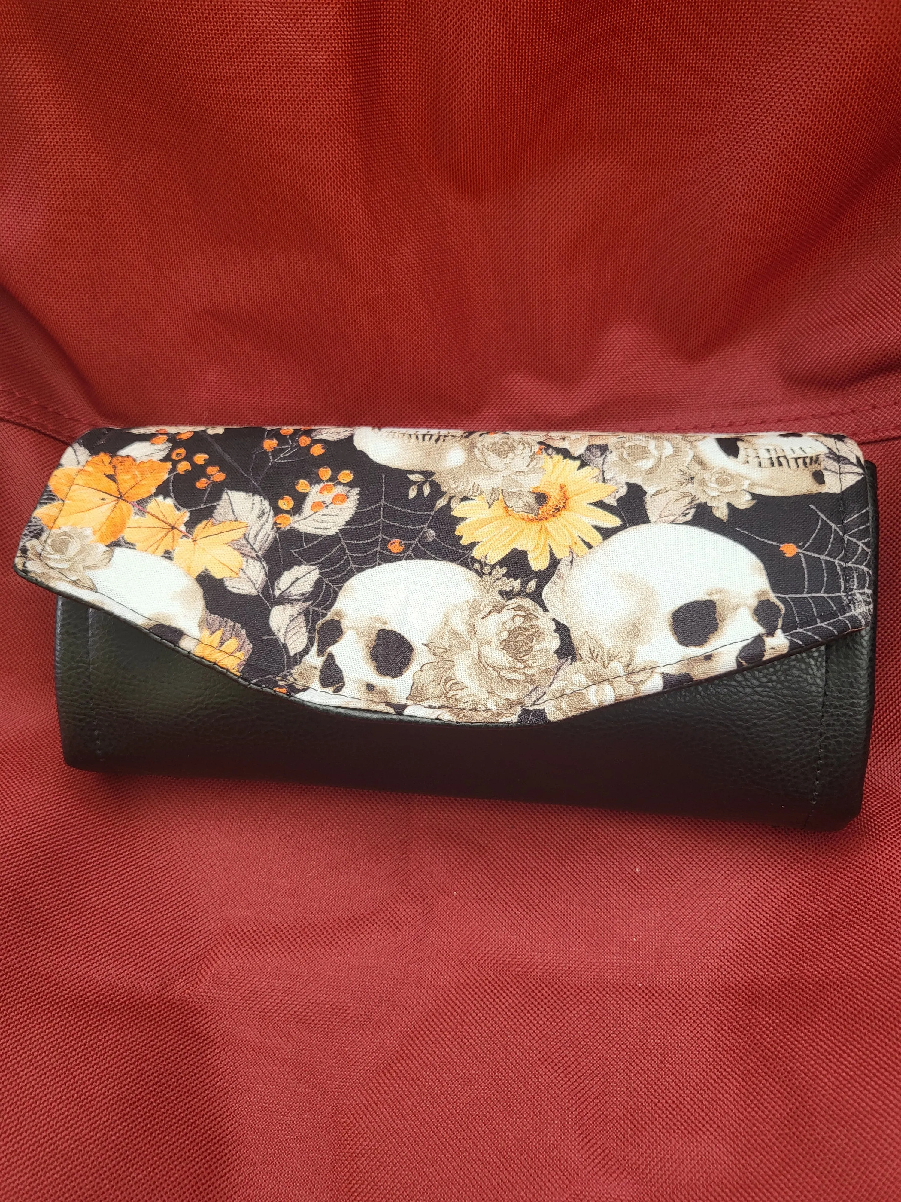 Handmade clutch wallets made with upcycled fabrics - skulls