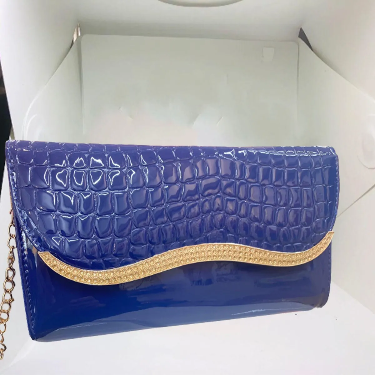 Royal Blue  Gold bar clutch from STYLEHEIST